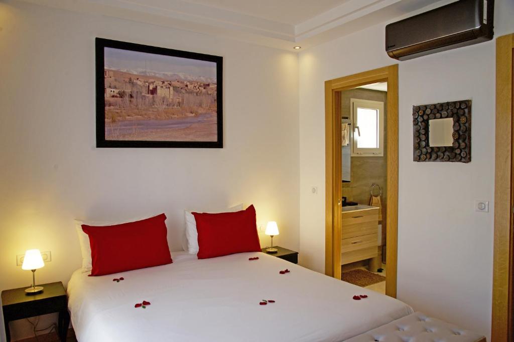 Postel nebo postele na pokoji v ubytování Appartement luxe vue Mer & Golf -Taghazout Bay