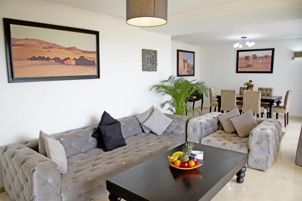 Posezení v ubytování Appartement luxe vue Mer & Golf -Taghazout Bay