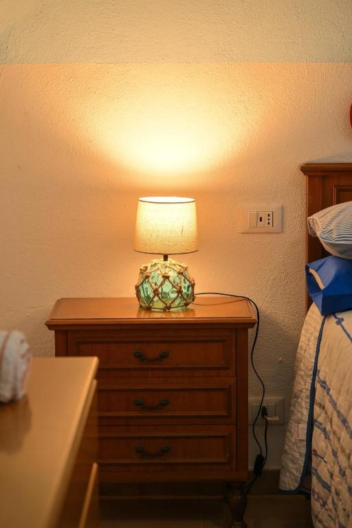 Letto o letti in una camera di Beach House Ischia