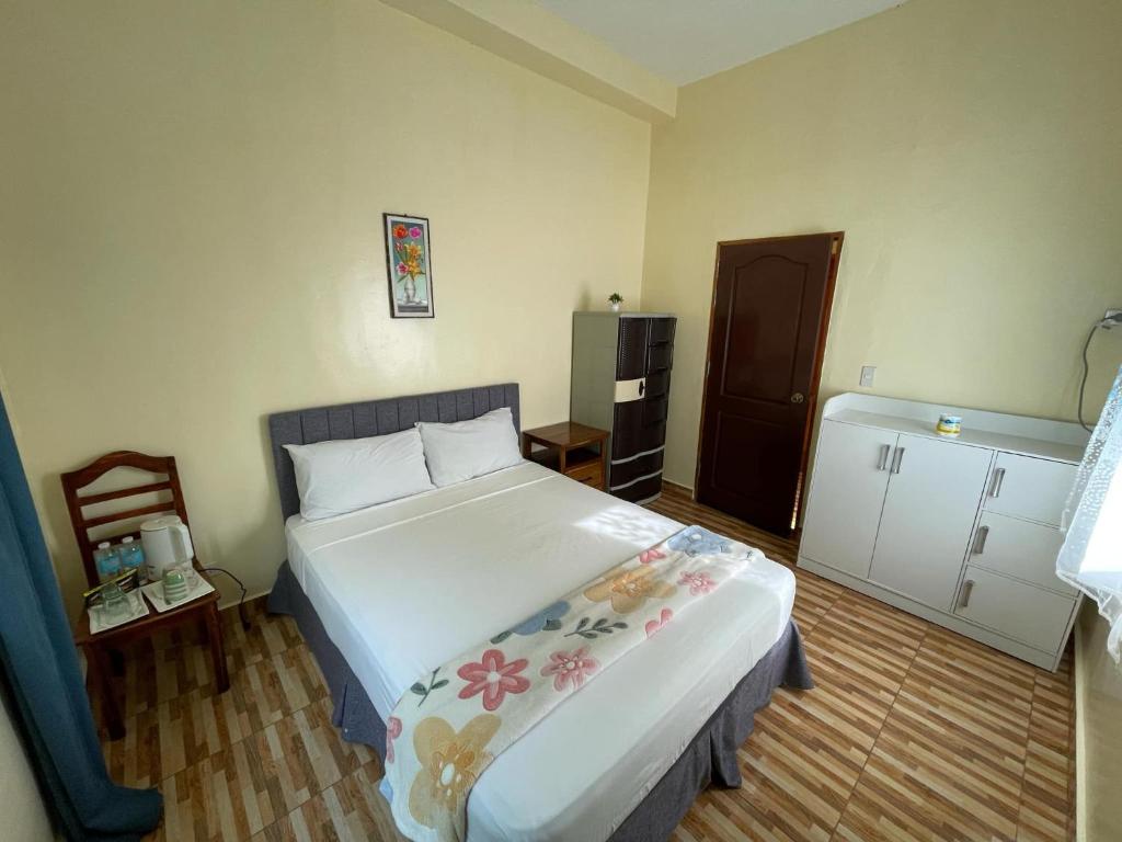 Postel nebo postele na pokoji v ubytování Whitesands Beach Resort