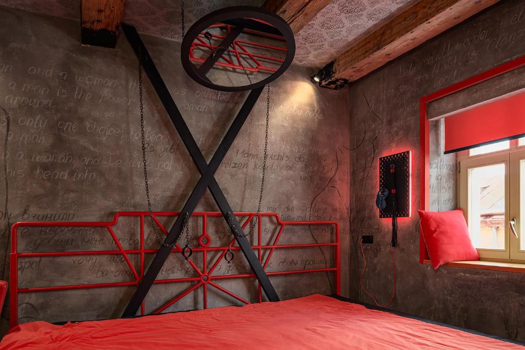 Postel nebo postele na pokoji v ubytování Masoch. Hotel & Cafe