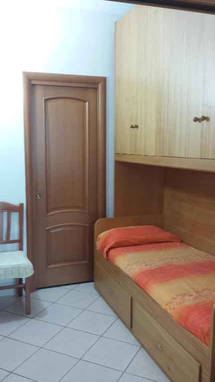 Postel nebo postele na pokoji v ubytování Cartaromana House
