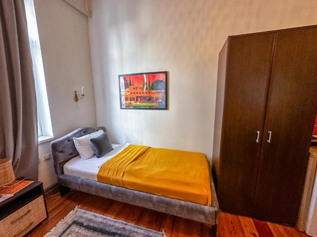 Postel nebo postele na pokoji v ubytování The Only One Apartments