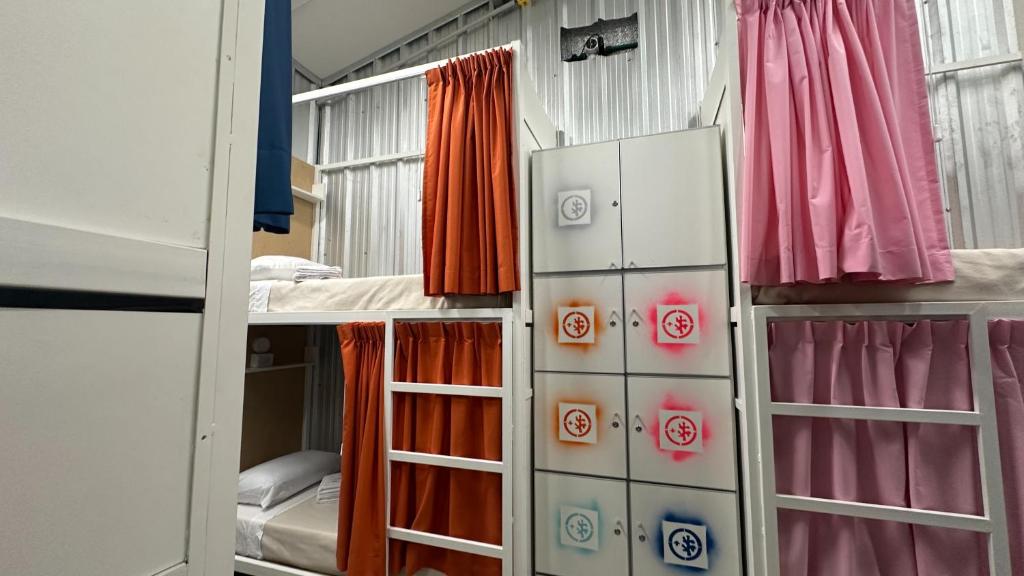 Ένα ή περισσότερα κρεβάτια σε δωμάτιο στο Hostel Chapa