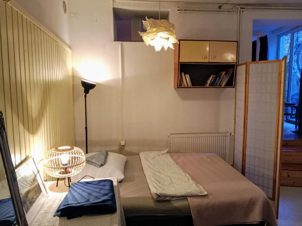 Posteľ alebo postele v izbe v ubytovaní Boho-Style-Apartment