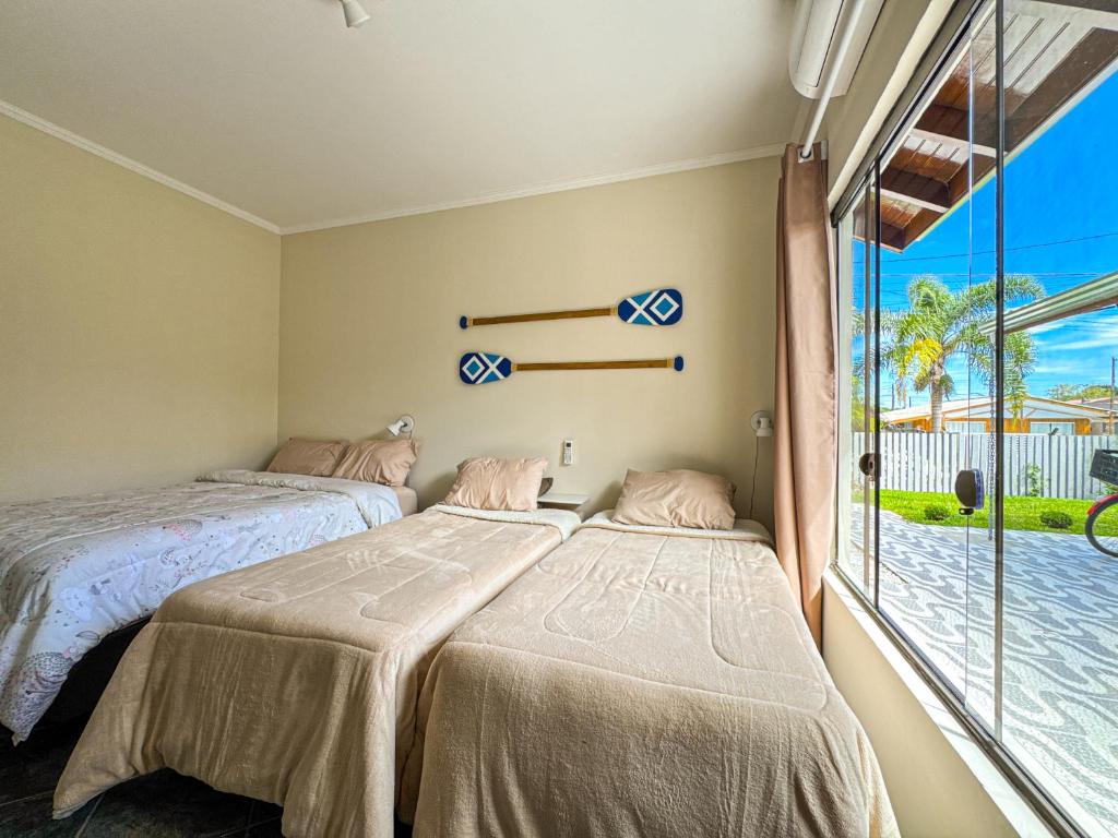 Cama ou camas em um quarto em Sobrado Aconchegante e Espaçoso