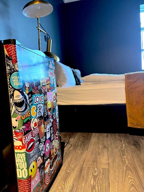 Postel nebo postele na pokoji v ubytování R13 - A Townhouse Hotel