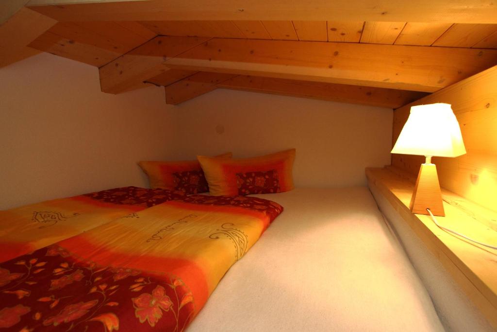 Postel nebo postele na pokoji v ubytování Gletscherchalet