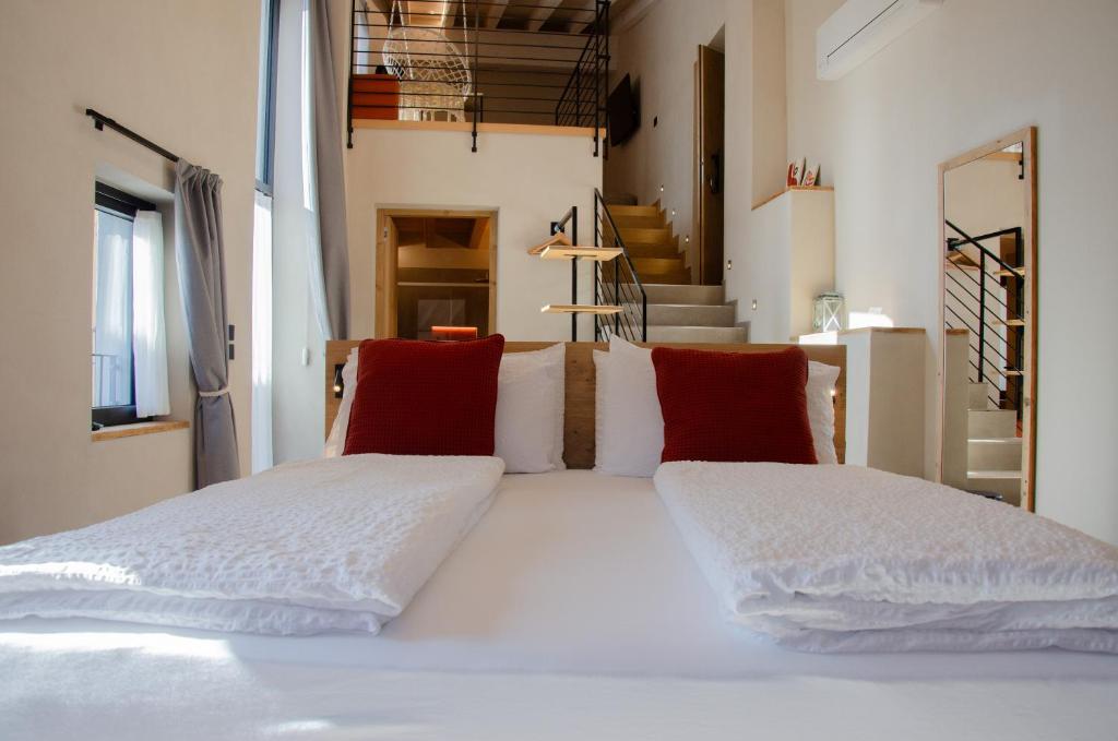 Postel nebo postele na pokoji v ubytování Stella D'Oro - Hotel & Apartments