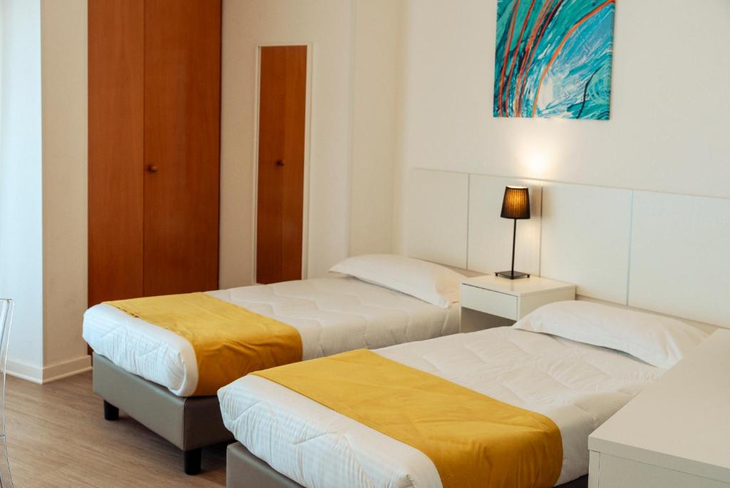 Postel nebo postele na pokoji v ubytování Hotel Bel 3