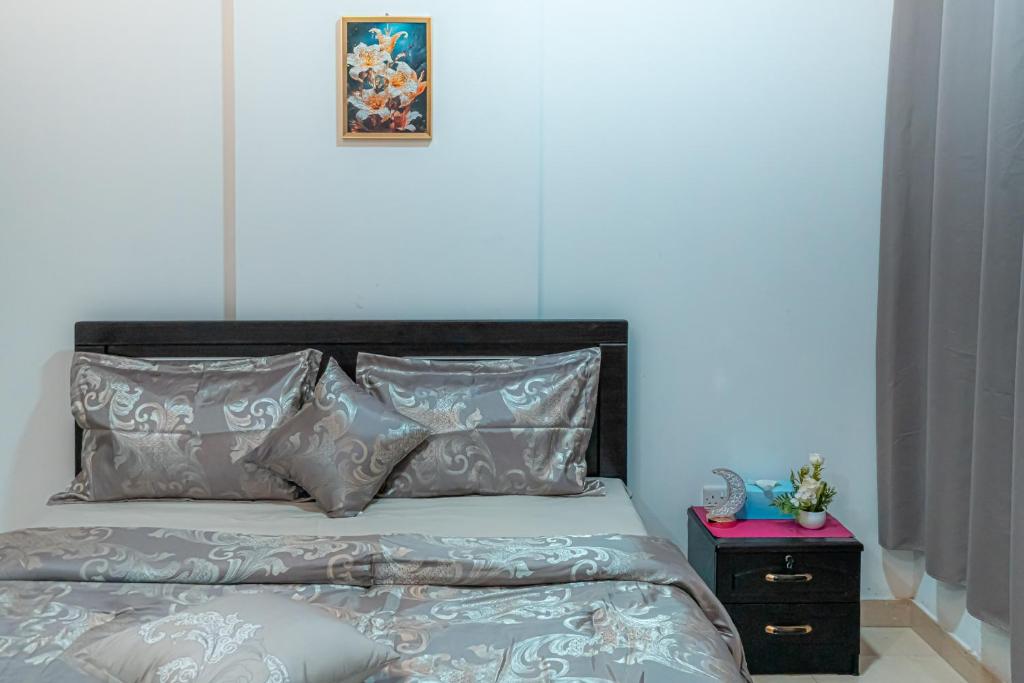 Ένα ή περισσότερα κρεβάτια σε δωμάτιο στο Home stay for family