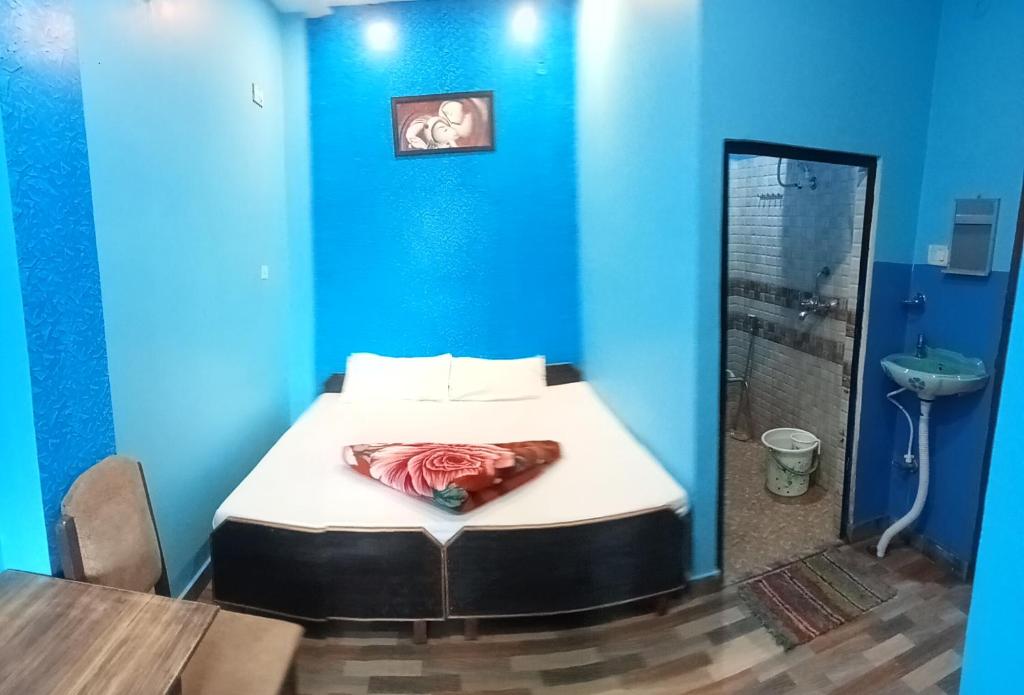 Postel nebo postele na pokoji v ubytování RELAX PAYING GUEST HOUSE