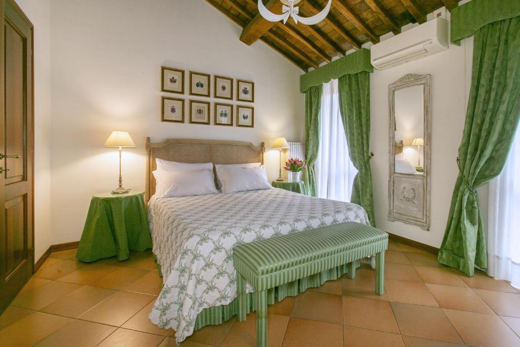 Posteľ alebo postele v izbe v ubytovaní Rasella Suites 47