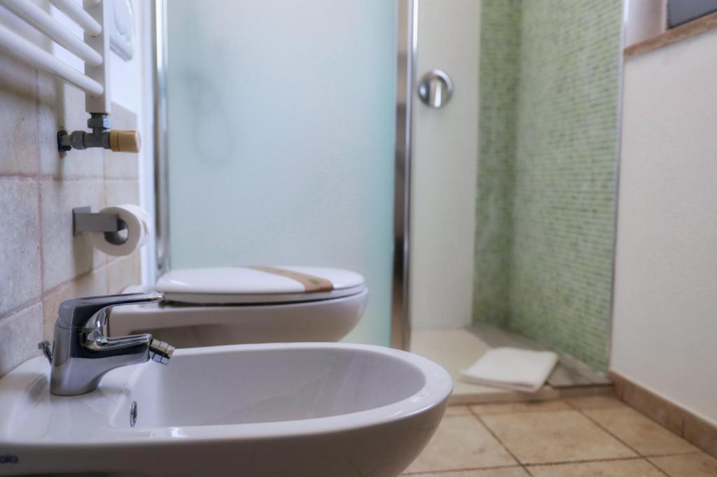 Koupelna v ubytování Masseria Trullo Sovrano Exclusive B&B