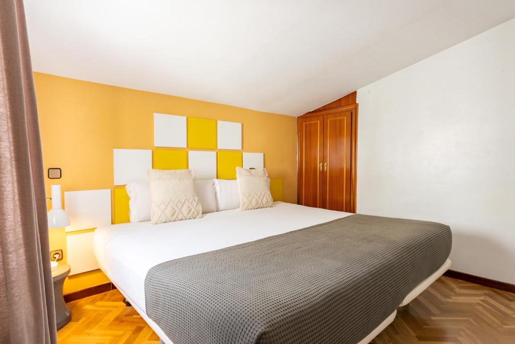 Postel nebo postele na pokoji v ubytování Smartr Madrid Chueca