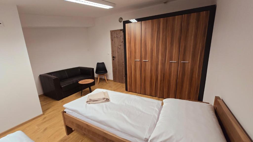 Postel nebo postele na pokoji v ubytování Penzion DRUCKER
