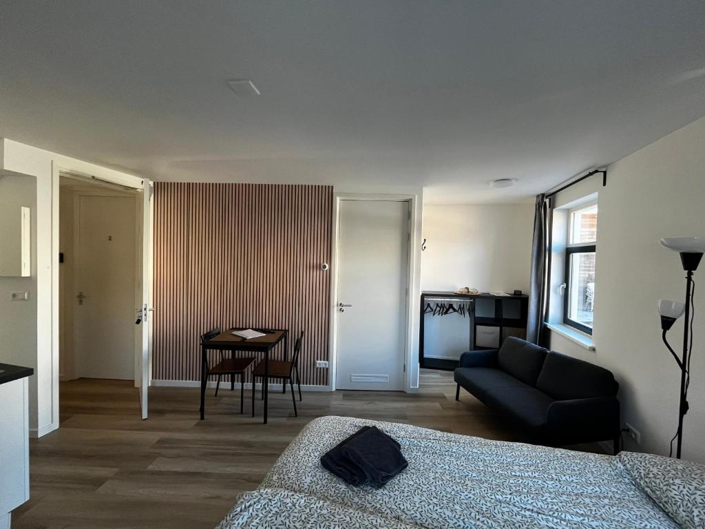 Letto o letti in una camera di Apartement hotel Stays by ADM