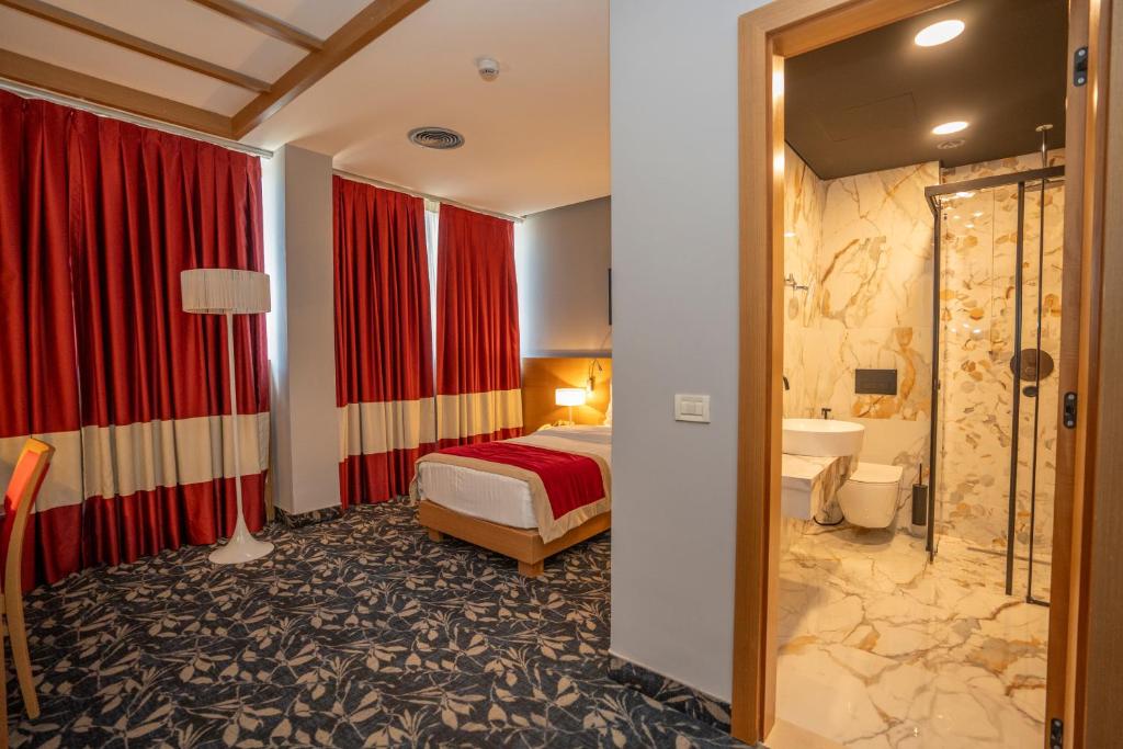 Koupelna v ubytování Hotel Colosseo & Spa