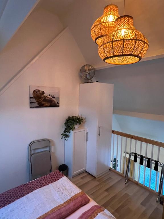 Postel nebo postele na pokoji v ubytování Thuis op Texel