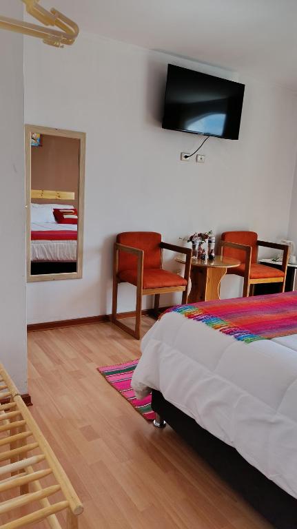 Postel nebo postele na pokoji v ubytování kuntur inn hotel