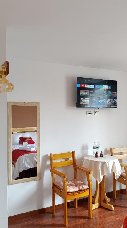 TV a/nebo společenská místnost v ubytování kuntur inn hotel