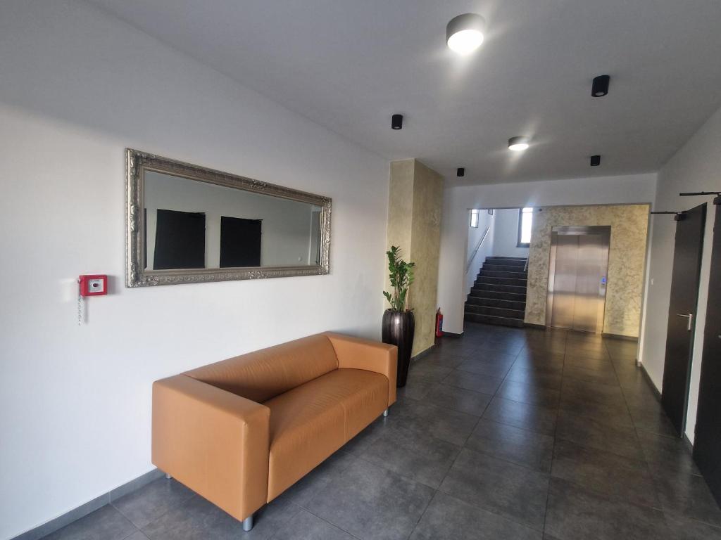 TV a/nebo společenská místnost v ubytování Magnolia Apartman