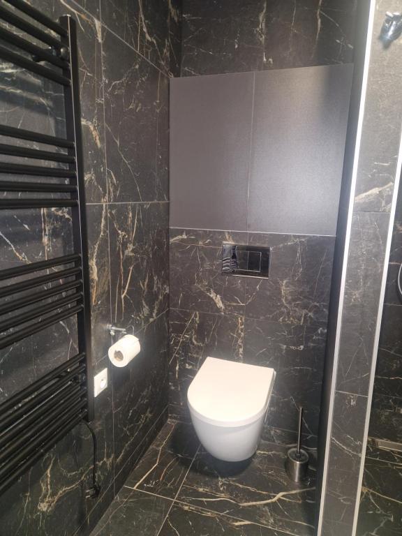 Koupelna v ubytování Magnolia Apartman