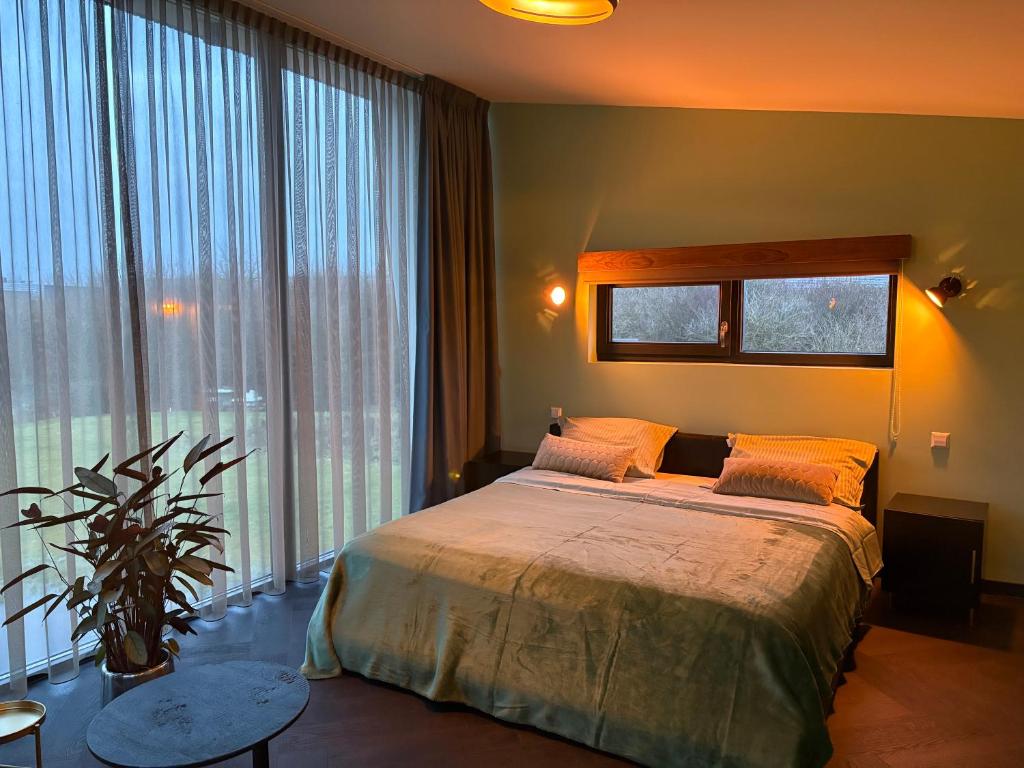 Postel nebo postele na pokoji v ubytování Casitas Wijchen