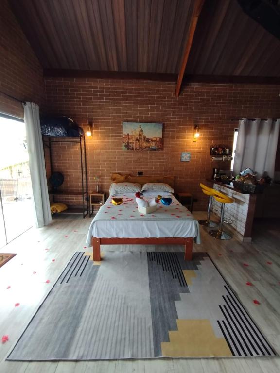 Postel nebo postele na pokoji v ubytování REFUGIO PIEMONTE Chalés
