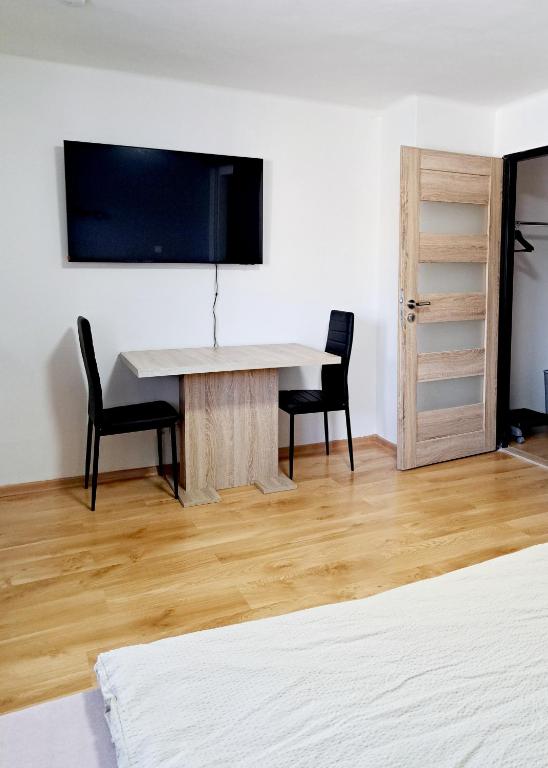 TV a/nebo společenská místnost v ubytování Apartmán Pod Ledovcem
