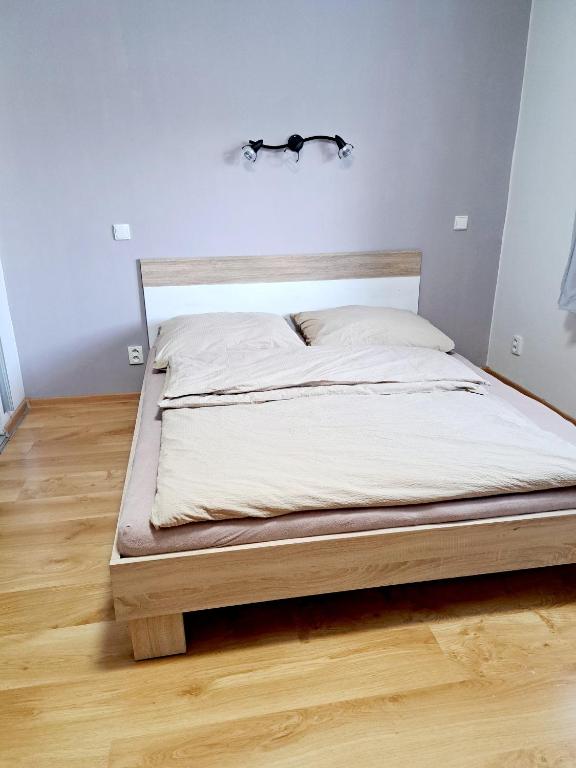 Postel nebo postele na pokoji v ubytování Apartmán Pod Ledovcem