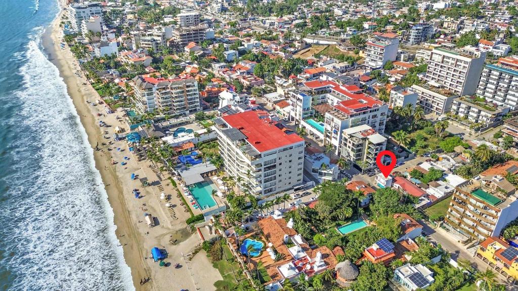 an aerial view of a beach and the ocean at Madison - 99 Steps to Beach in Golden Zone in Bucerías