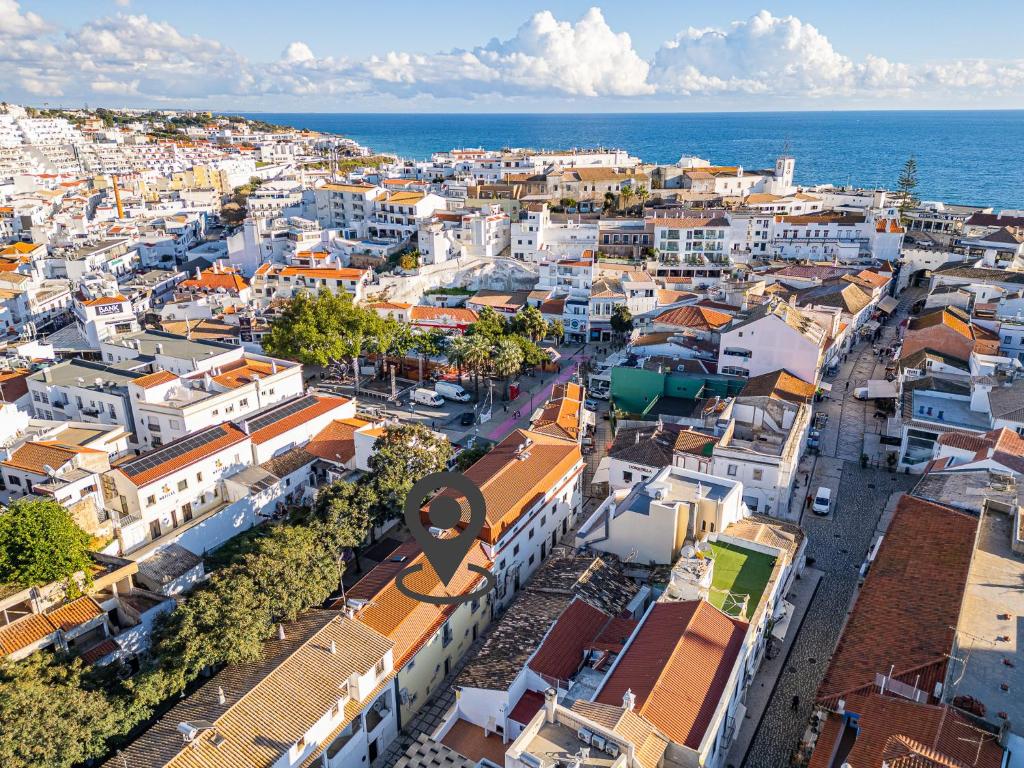 an aerial view of a city with the ocean at Old Town Charm Apartment in Albufeira