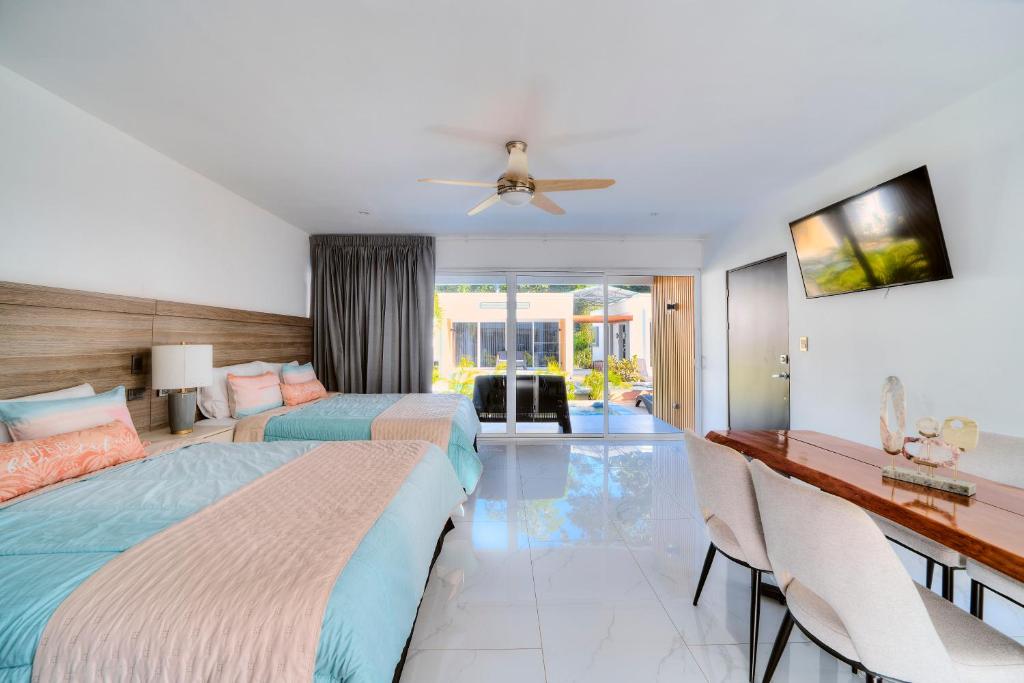 Postel nebo postele na pokoji v ubytování Villas Ríos del Caribe