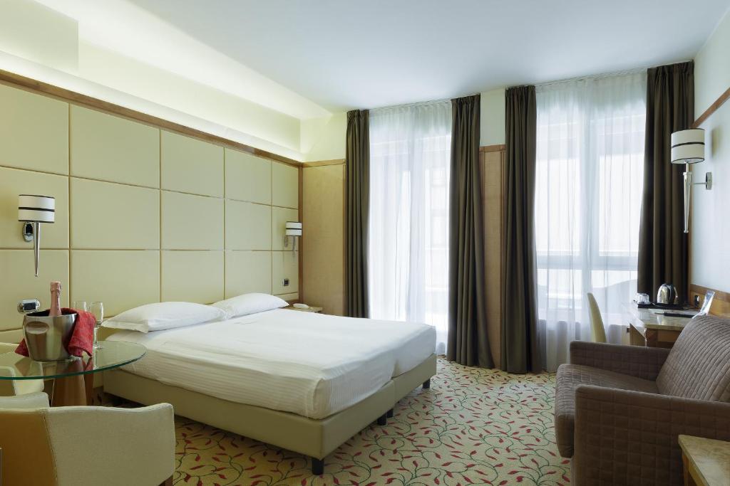Postel nebo postele na pokoji v ubytování Hotel Teco