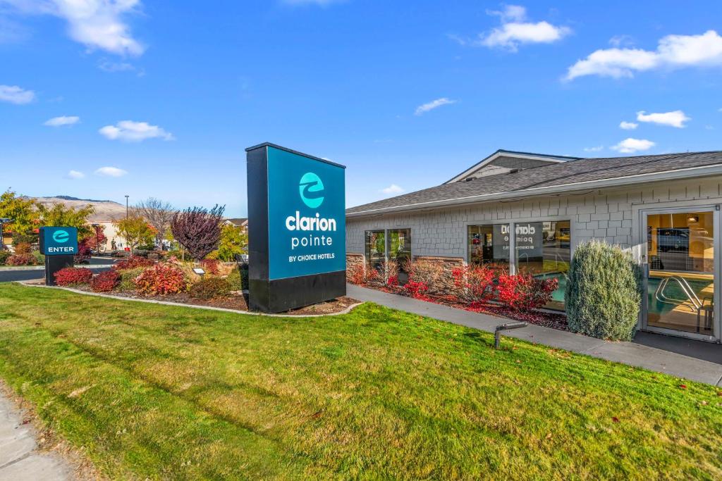 a sign in front of a building at Clarion Pointe Wenatchee in Wenatchee