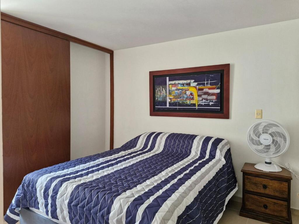Postel nebo postele na pokoji v ubytování Montezuma living 307