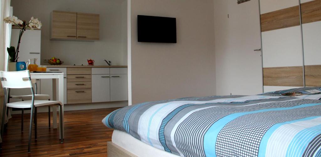 Postel nebo postele na pokoji v ubytování Gasthof Franzosenhof