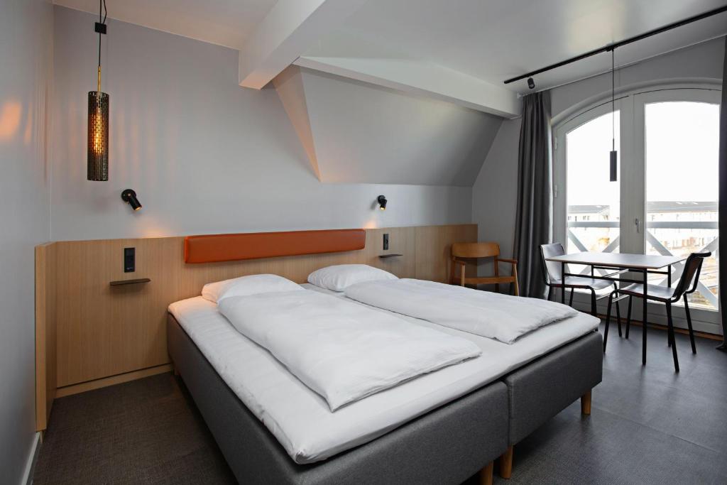 Postel nebo postele na pokoji v ubytování Four Points Flex by Sheraton Koge