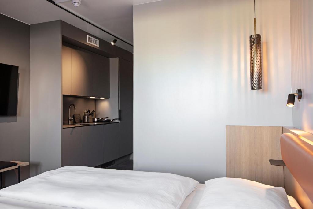 Postel nebo postele na pokoji v ubytování Four Points Flex by Sheraton Koge