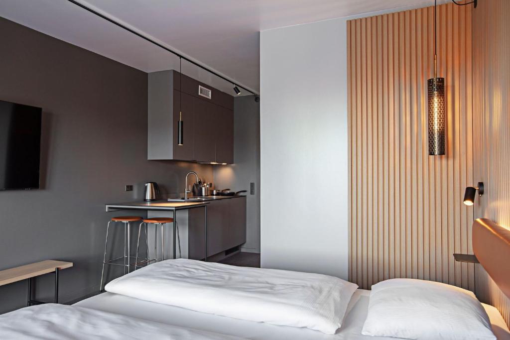 Postel nebo postele na pokoji v ubytování Four Points Flex by Sheraton Koge