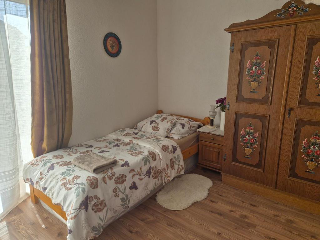 Postel nebo postele na pokoji v ubytování Apartmány Anička vo Važci