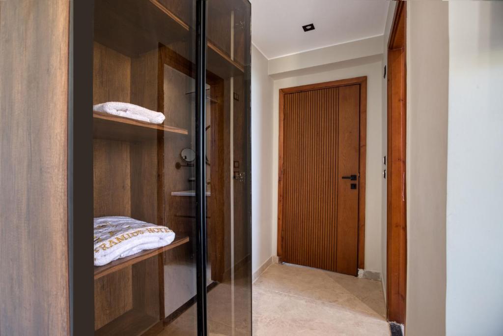 Postelja oz. postelje v sobi nastanitve Gaia Pyramids Hotel