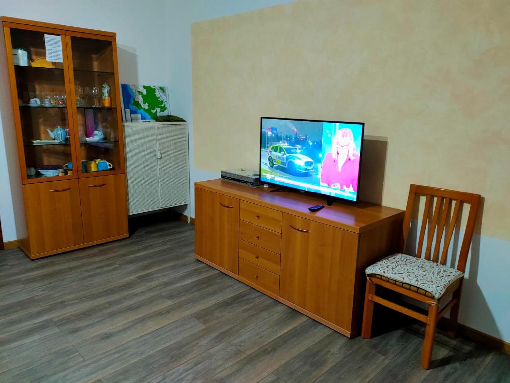 TV a/nebo společenská místnost v ubytování Casa Vacanze LIBECCIO Free private parking