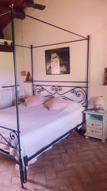 Postel nebo postele na pokoji v ubytování Monte Paradiso Agriturismo