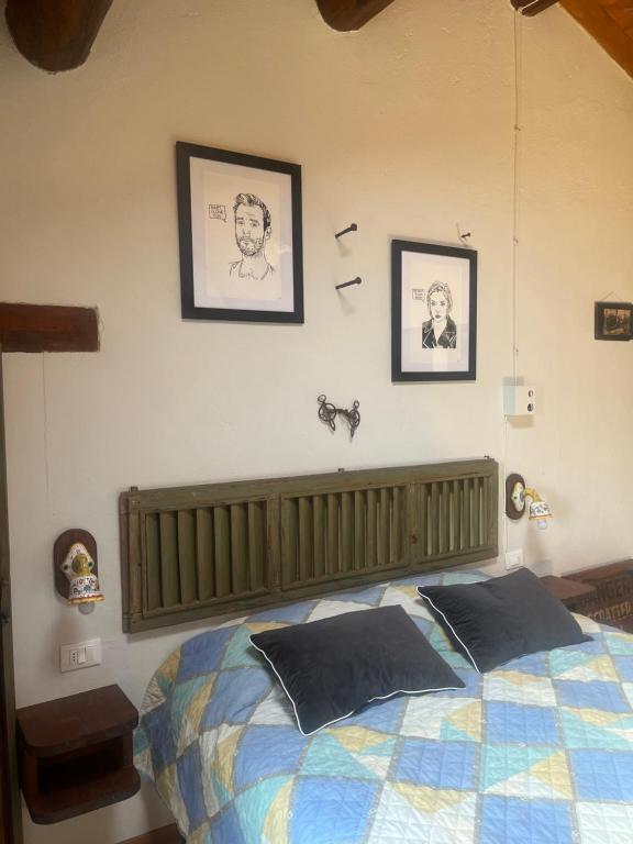 Postel nebo postele na pokoji v ubytování Monte Paradiso Agriturismo