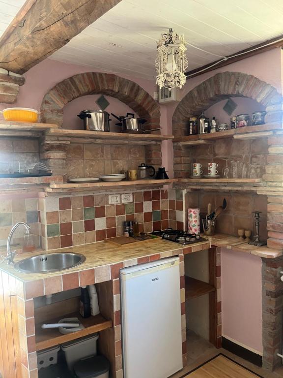 Kuchyň nebo kuchyňský kout v ubytování Monte Paradiso Agriturismo