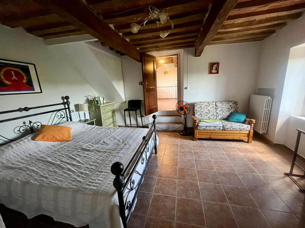 Postel nebo postele na pokoji v ubytování Monte Paradiso Agriturismo