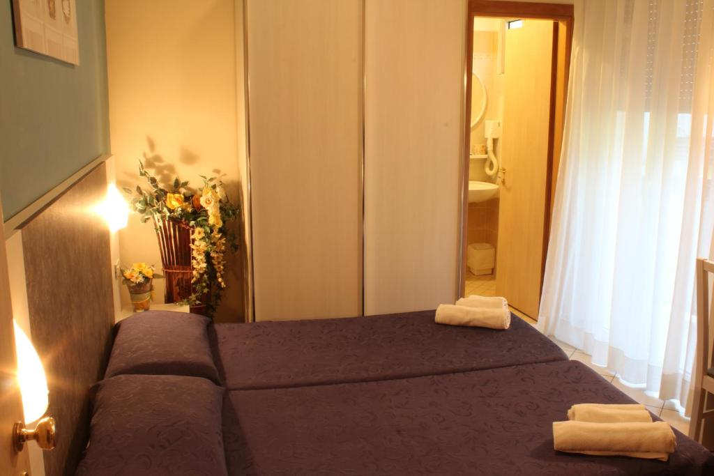 Postel nebo postele na pokoji v ubytování Hotel Senyor