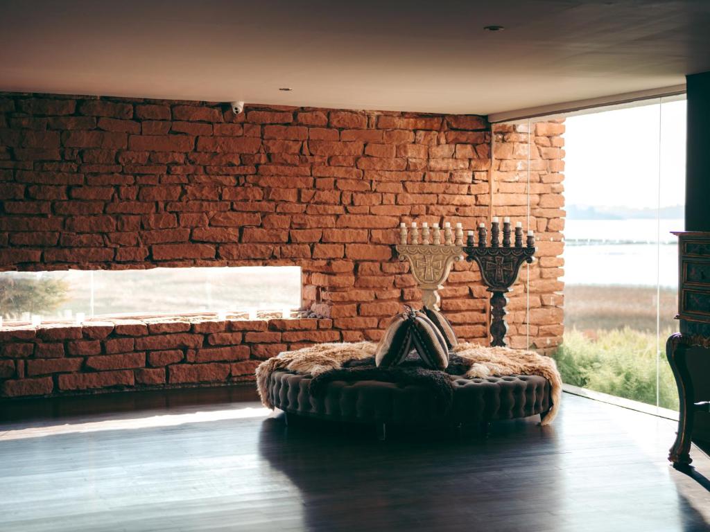 Posezení v ubytování Titilaka - Relais & Châteaux